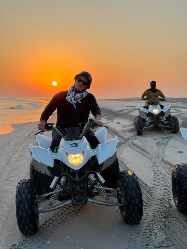 Coastal view with quad bike tracks