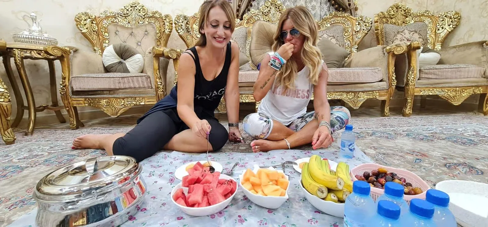 Guests sharing food in a home setting